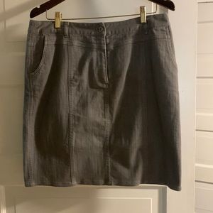 This is a gorgeous summer grey denim blend skirt suit by Eric Alexandre